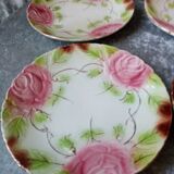 Series of 6 plates in slip decorated with roses