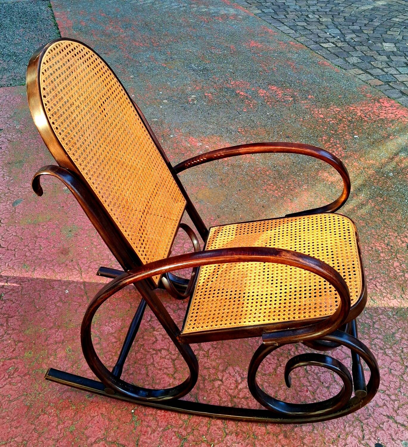 Rocking chair. Bent wood and cane.
