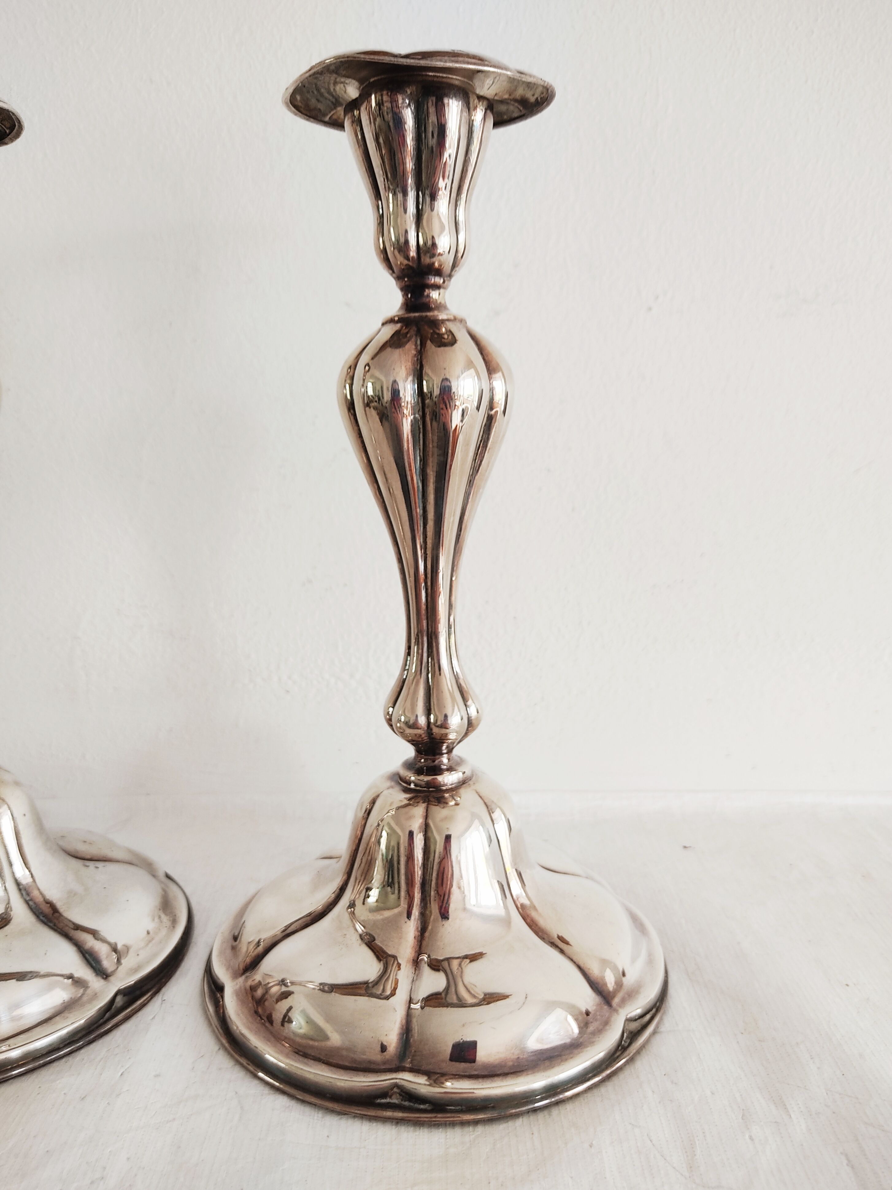 Pair of silver metal candlesticks