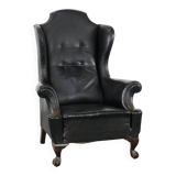 Antique black English cow leather wingback armchair from the 19th century