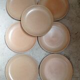 Set of seven plates in sandstone