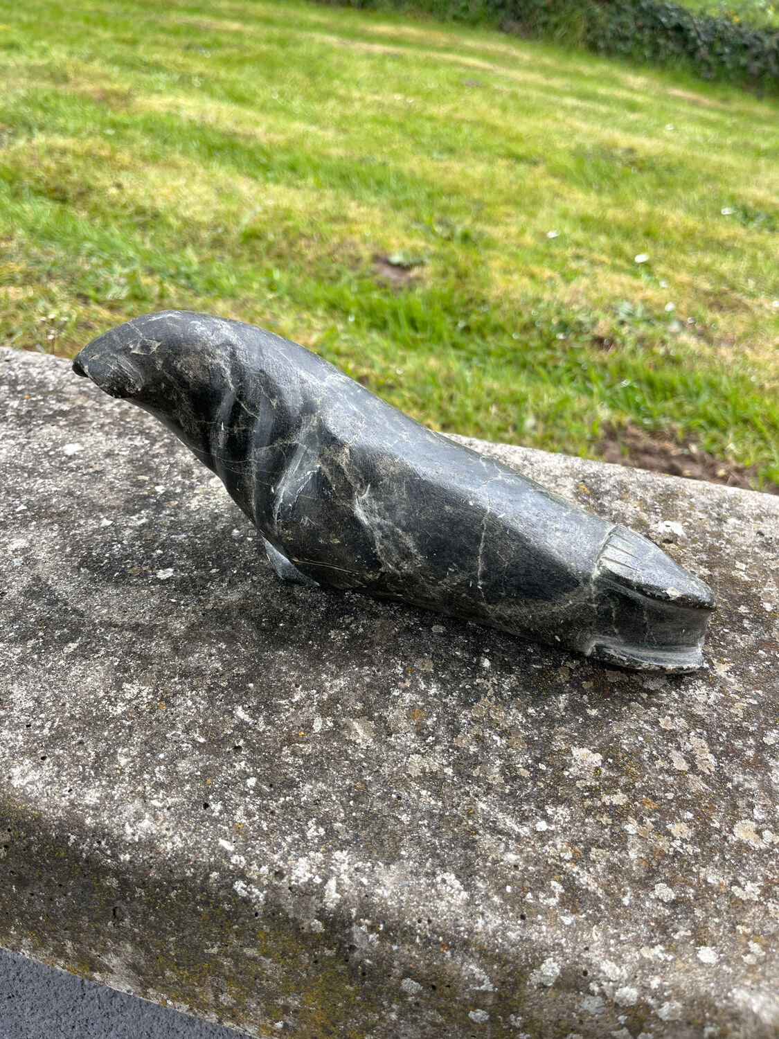 Statue, ancient Inuit sculpture in soapstone.