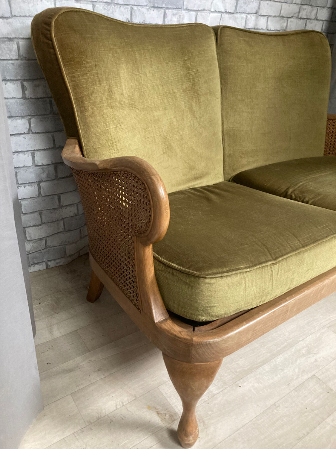 Cane and velvet fabric bench