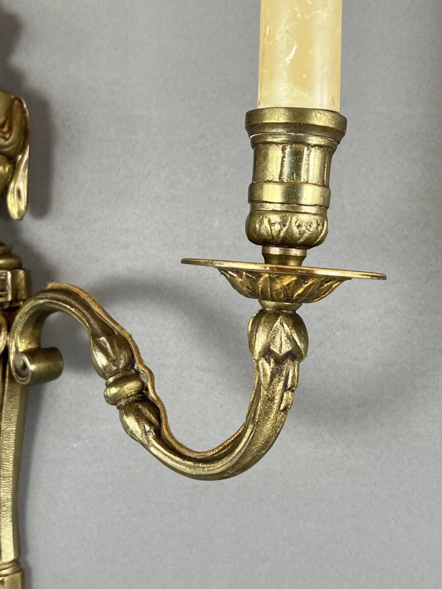 Set of four bronze wall sconces, Louis XVI style, 20th century.