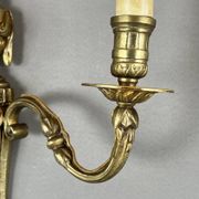 Set of four bronze wall sconces, Louis XVI style, 20th century.