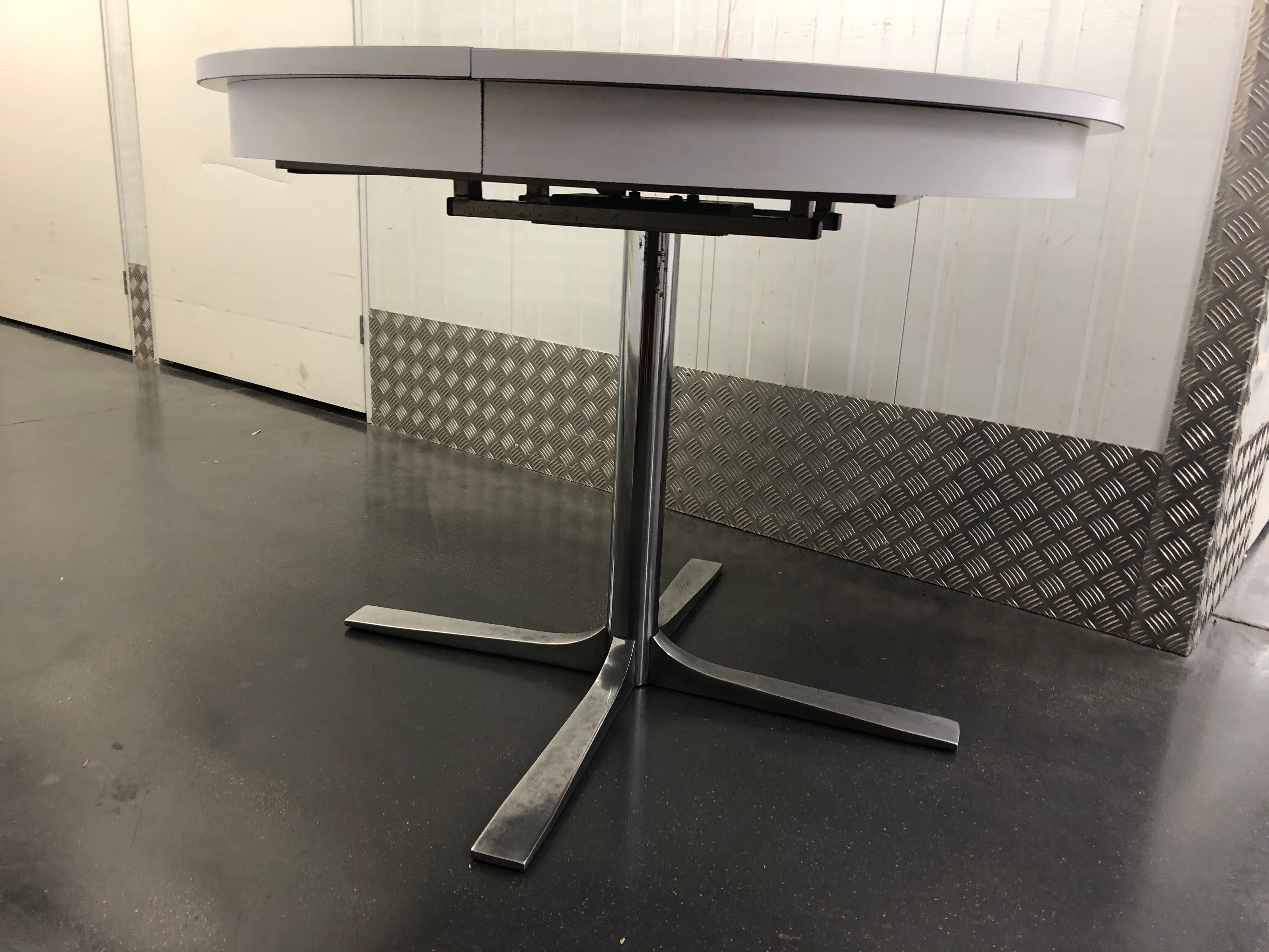 Rosalie round table with white extensions and chrome foot circa 1970