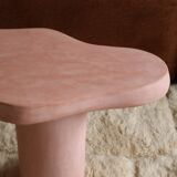 Organic shaped coffee table in pink teracotta tadelakt