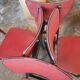 Lot de 4 chaises pieds compas noirs et rouges