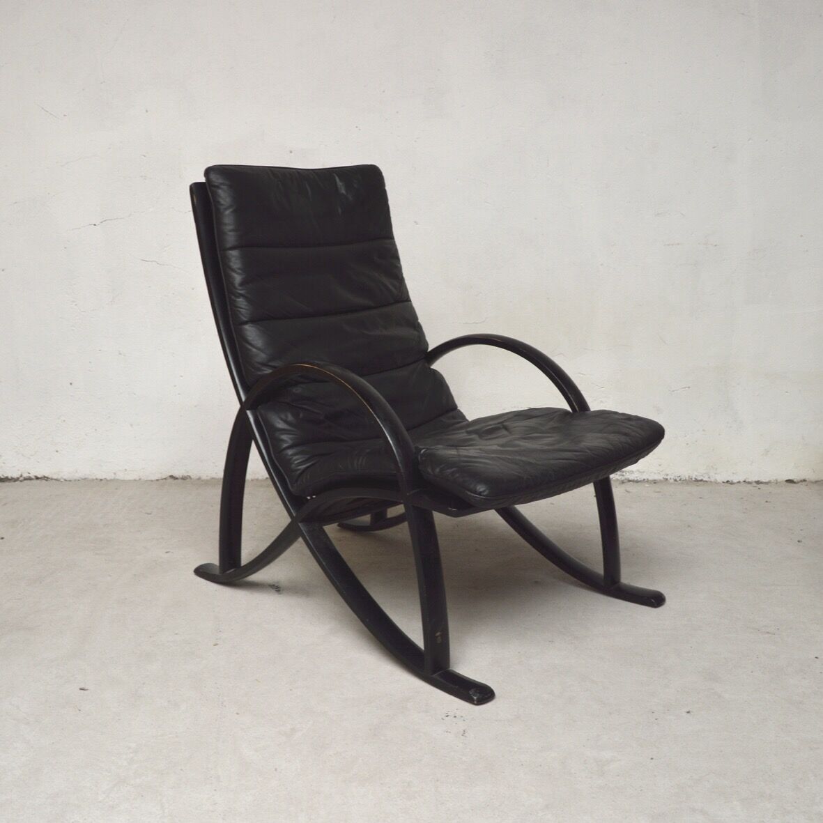 Black leather armchair and canning