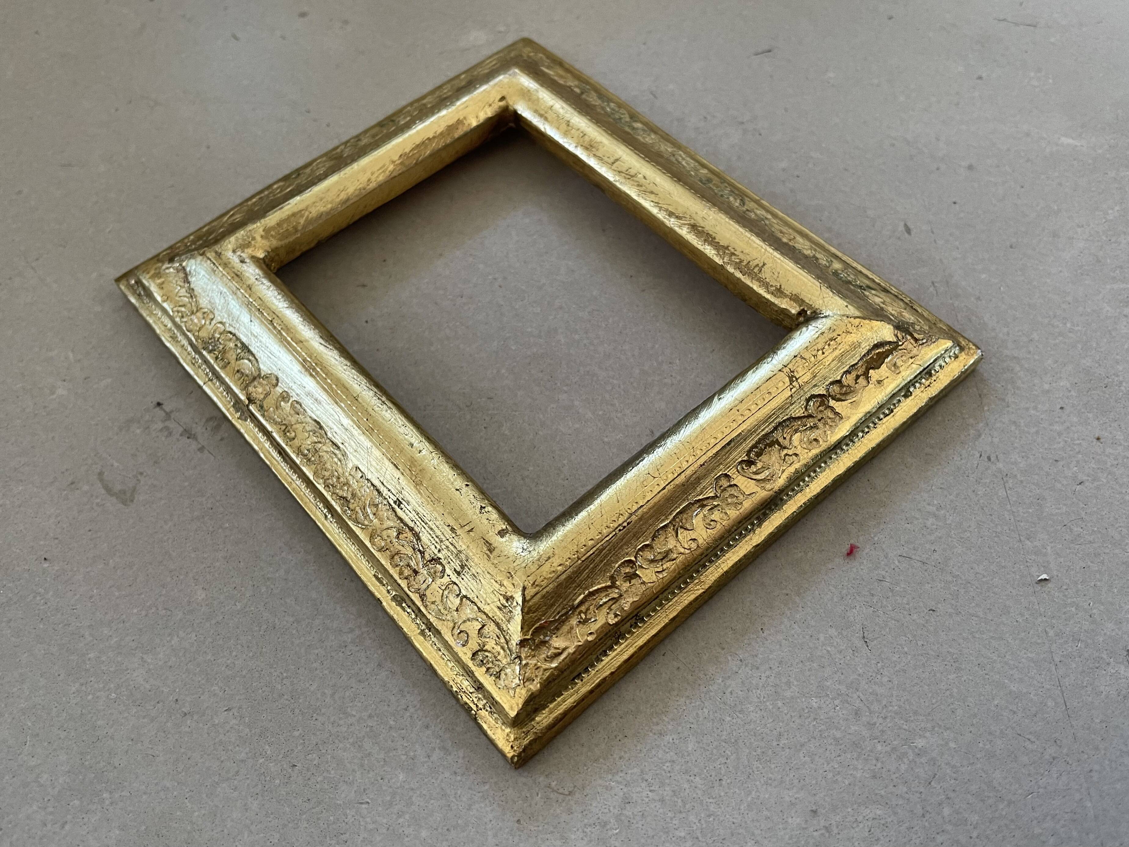 Small golden frame with old keys 10x12cm