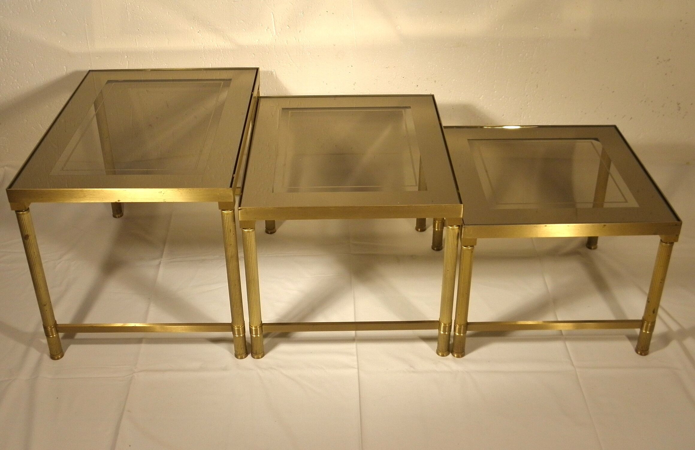 Brass and glass nesting tables