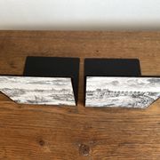 Bookends 1960 between Fornasetti's grey and Toile de Jouy views of Paris.