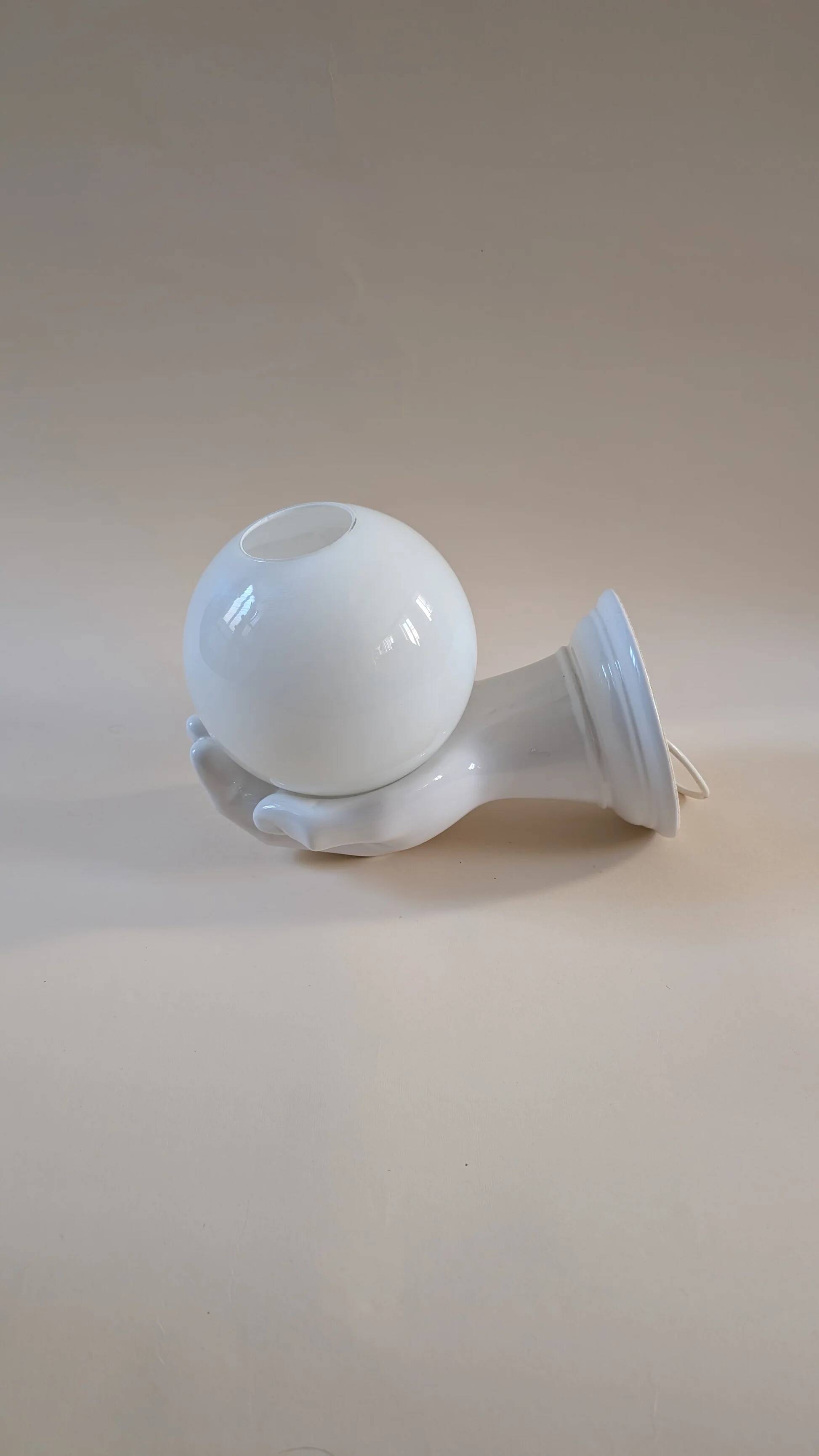 Ceramic hand wall lamp, 1980