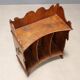 Small portable antique library in carved walnut, 19th century.