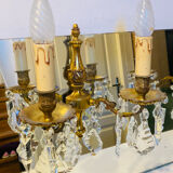 Pair of gilt bronze wall sconces with pendants from the mid-20th century.