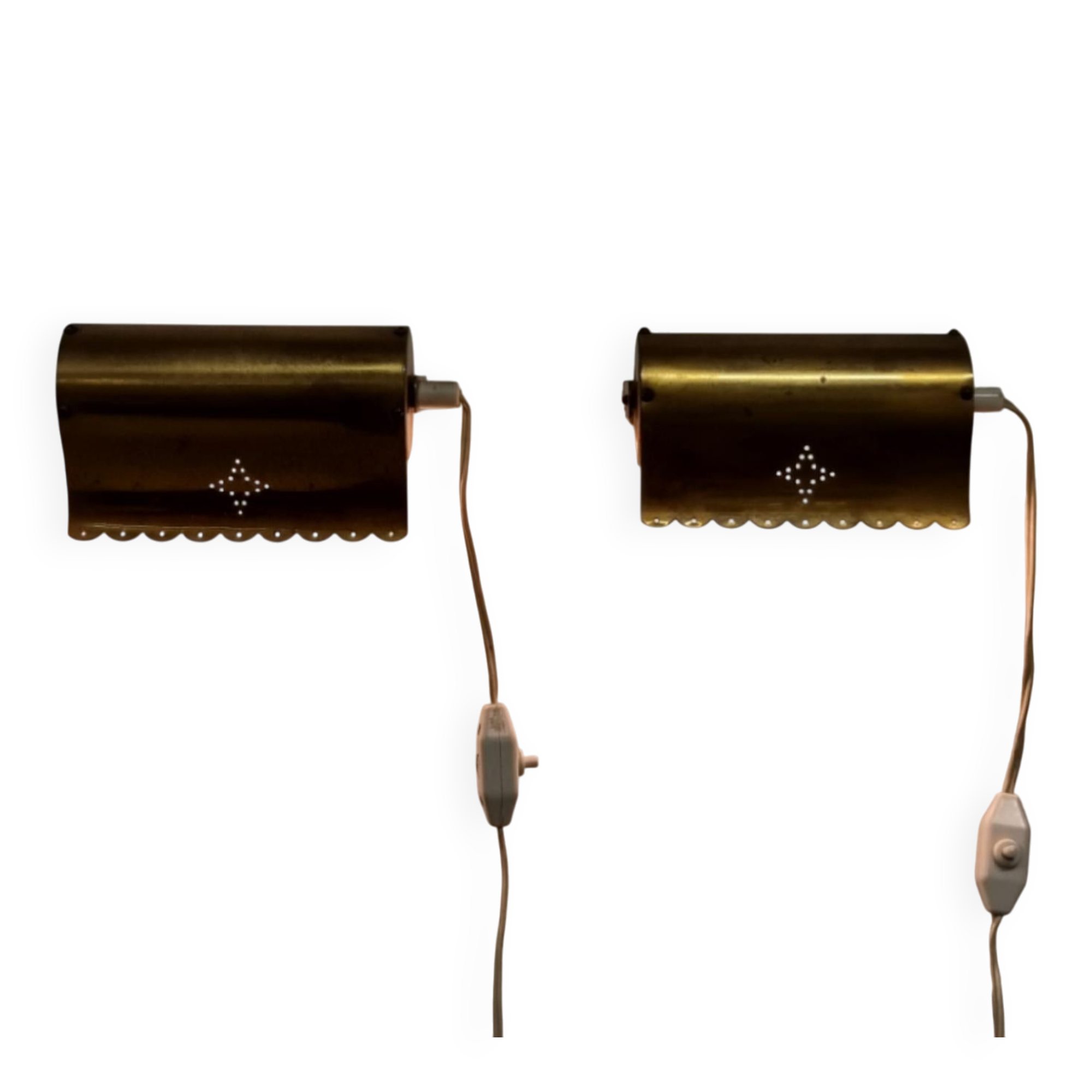 A pair of charming wall sconces/branches in brass with a star pattern, modern Scandinavian style.