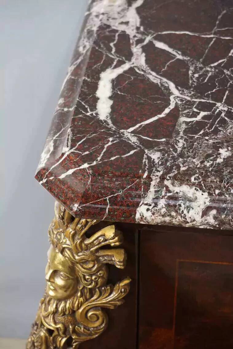 Antique chest of drawers in mahogany, Amboyna burl, red marble and bronze