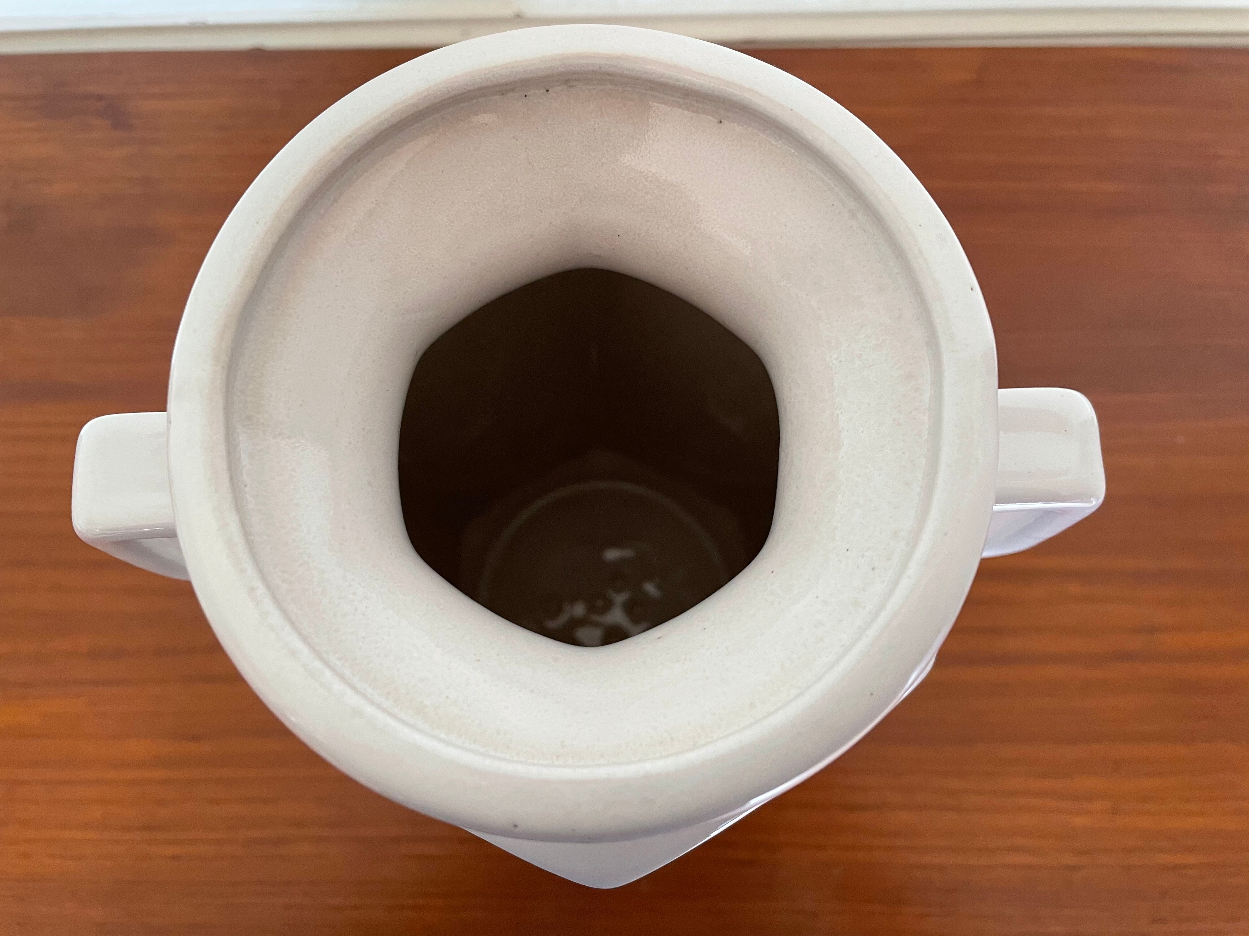 White ceramic ansé vase