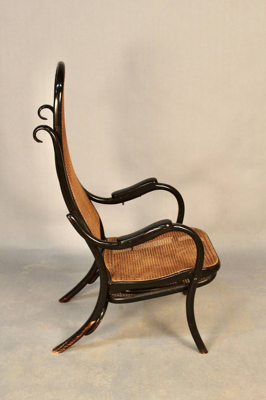 Bentwood cane armchair with mechanism and footrest