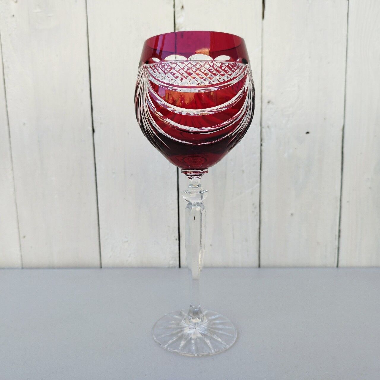 Six vintage coloured cut crystal wine glasses
