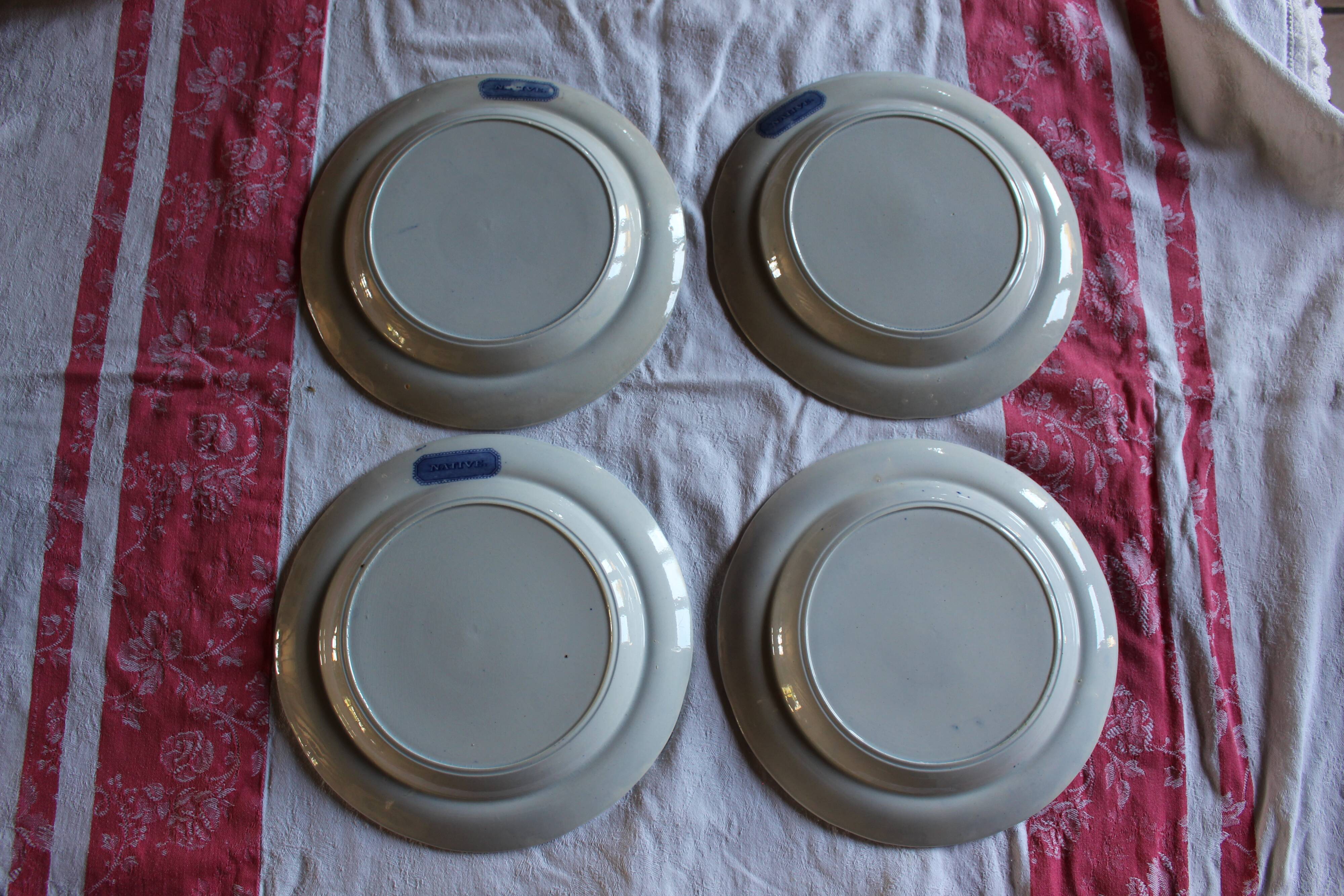 Lot of 4 flat plates in English porcelain "Native"