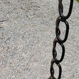 Vintage floor lamp from the 50s in blackened iron in the shape of a chain