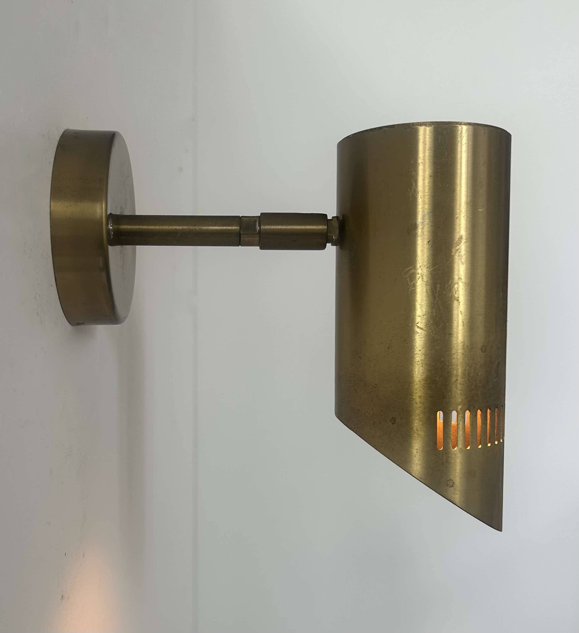 Vintage adjustable wall light, solid perforated brass, France 1960