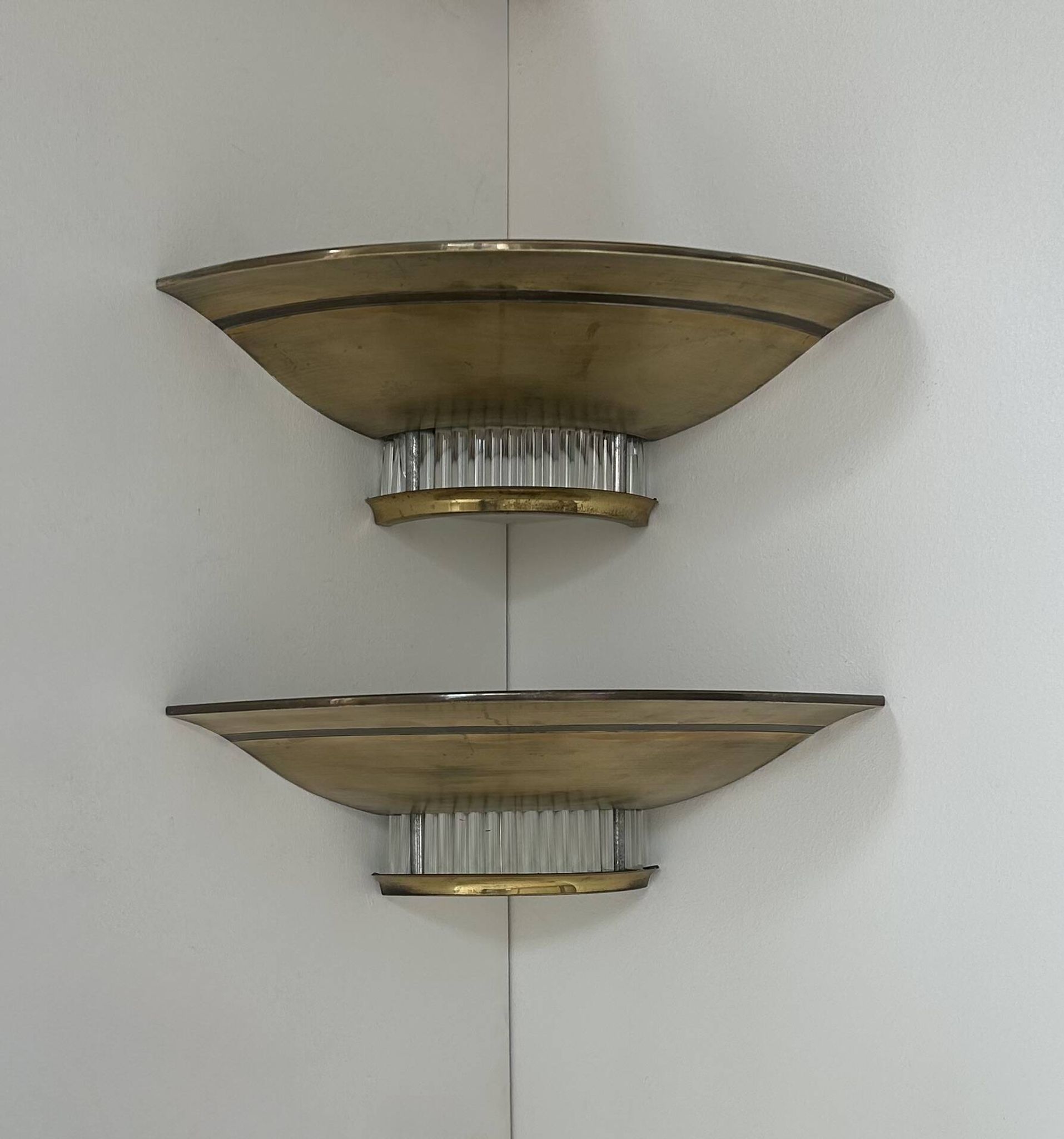 Pair of Art Deco corner sconces, brass and glass, France 1930