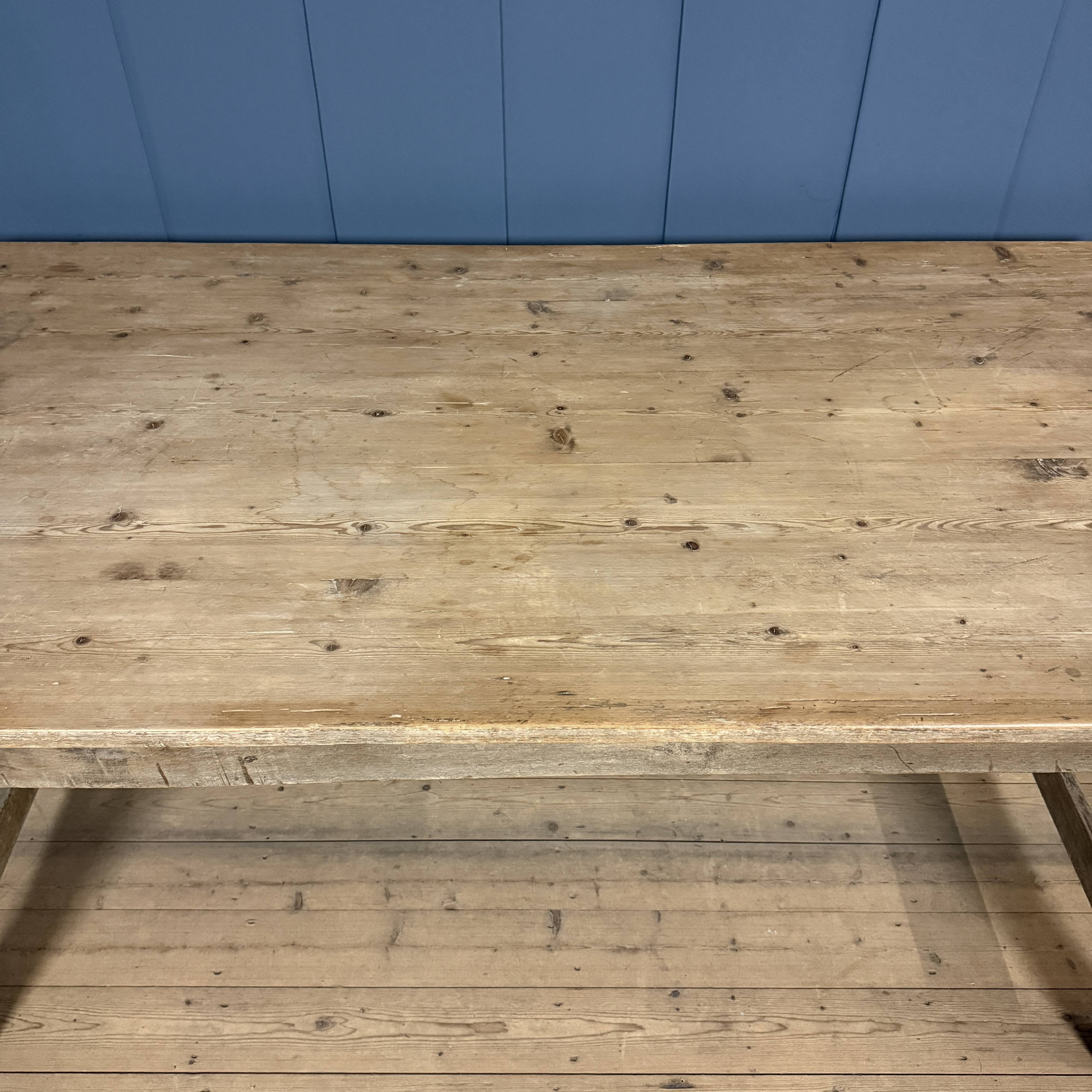 French farmhouse dining table with pine top and oak base