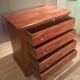 Small Louis Philippe chest of drawers with cut corners.
