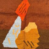 Moroccan wool rug with traditional colourful patterns, size 140 x 260 cm.