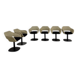 Series of six swivel chairs with an organic shell, patterned fabric and base.