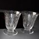 Two Baccarat glasses model "Michelangelo" in engraved crystal.