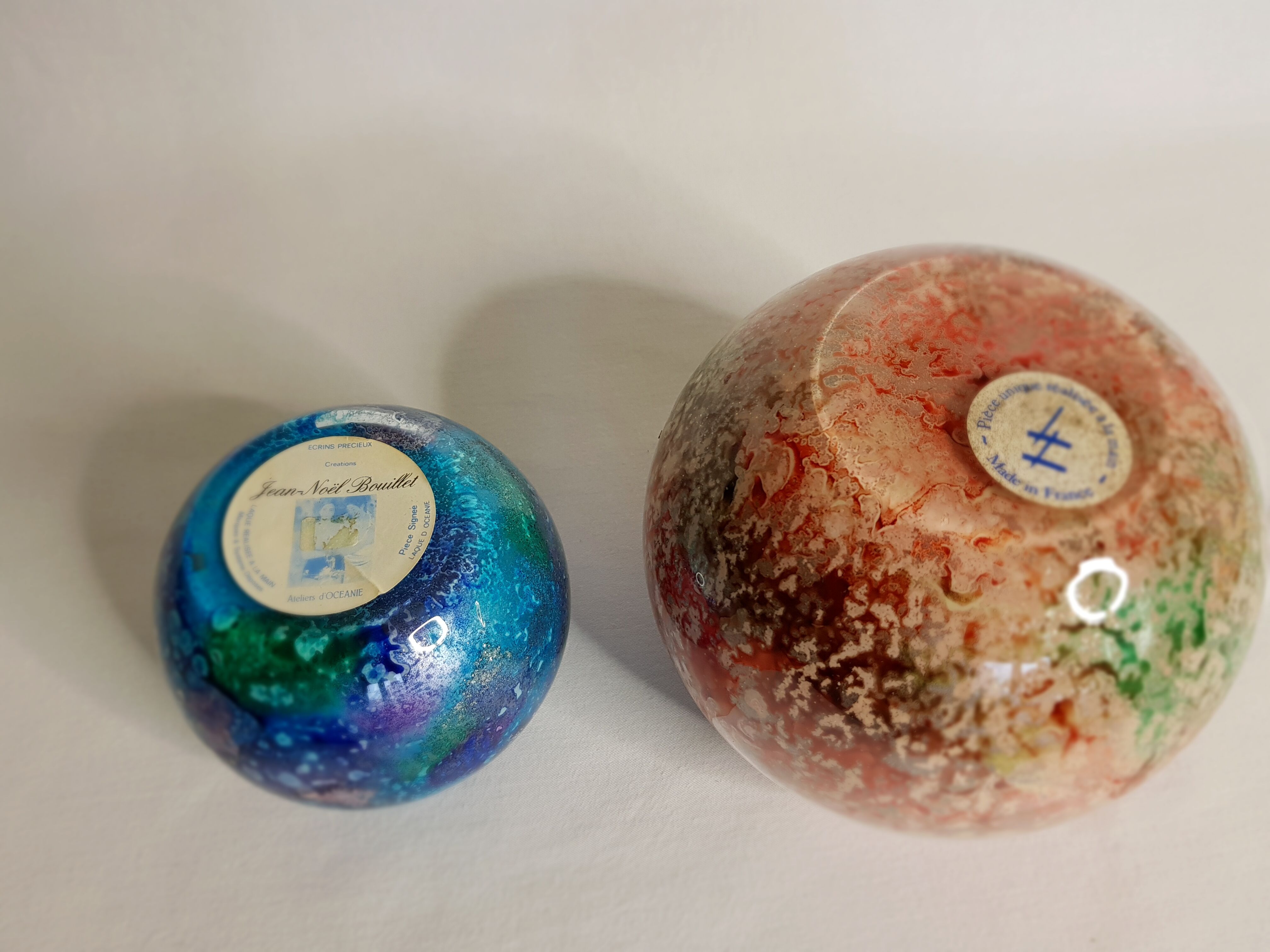 Set of two hand lacquered glass ball vases signed "Laque Line" and "Jean-Noel Bouillet"