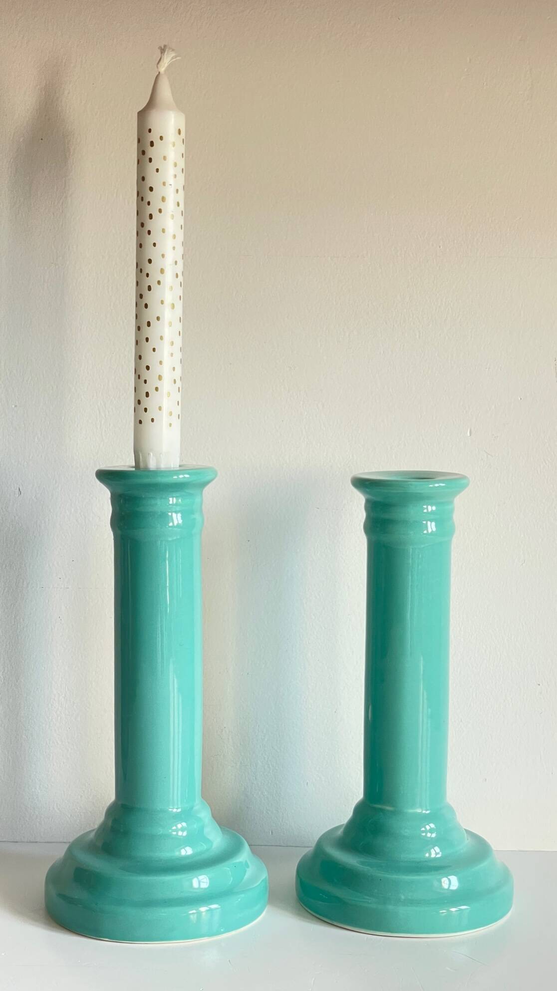 Pair of vintage ocean blue ceramic candlesticks