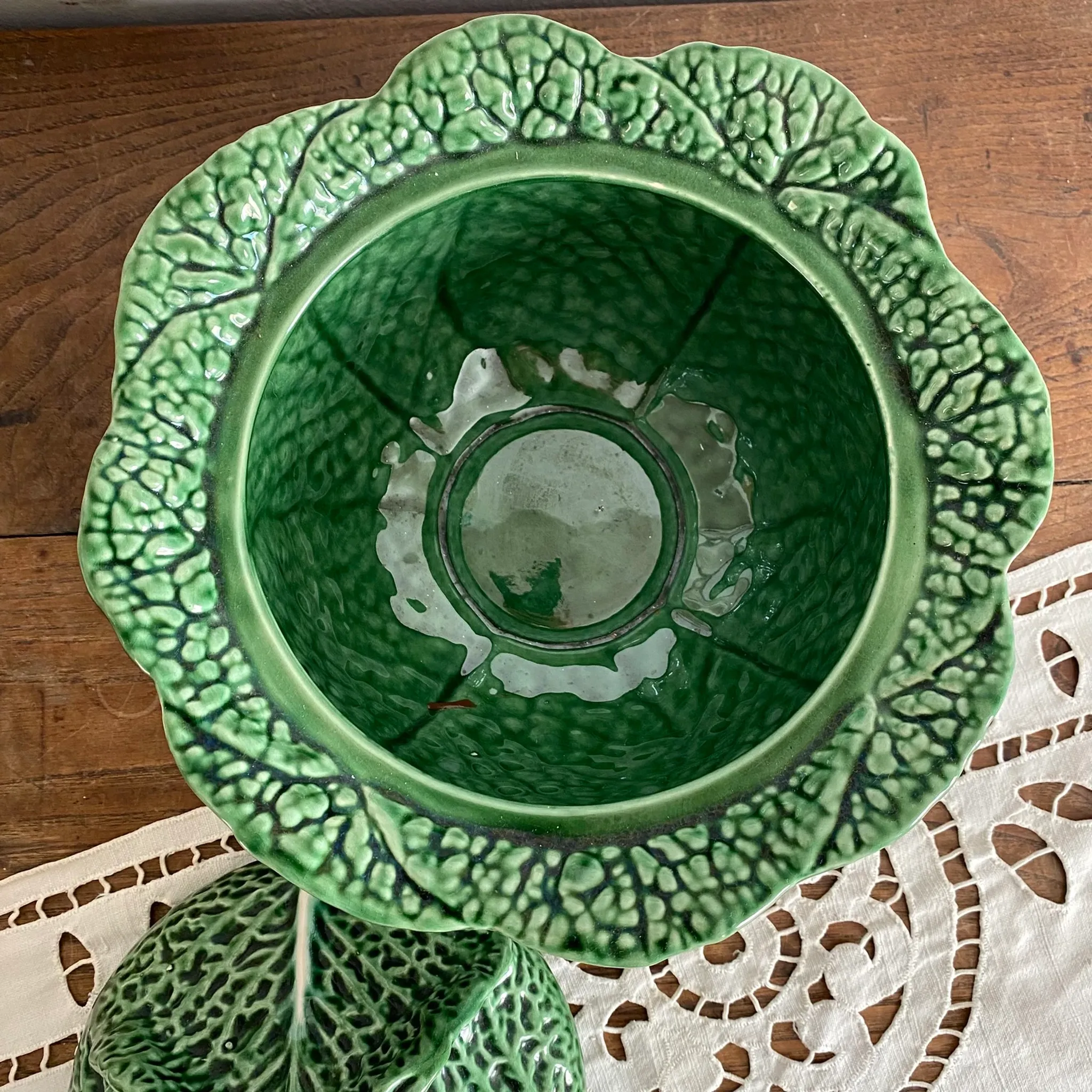 Large soup tureen in earthenware with a cabbage design, along with a dish and spoon.