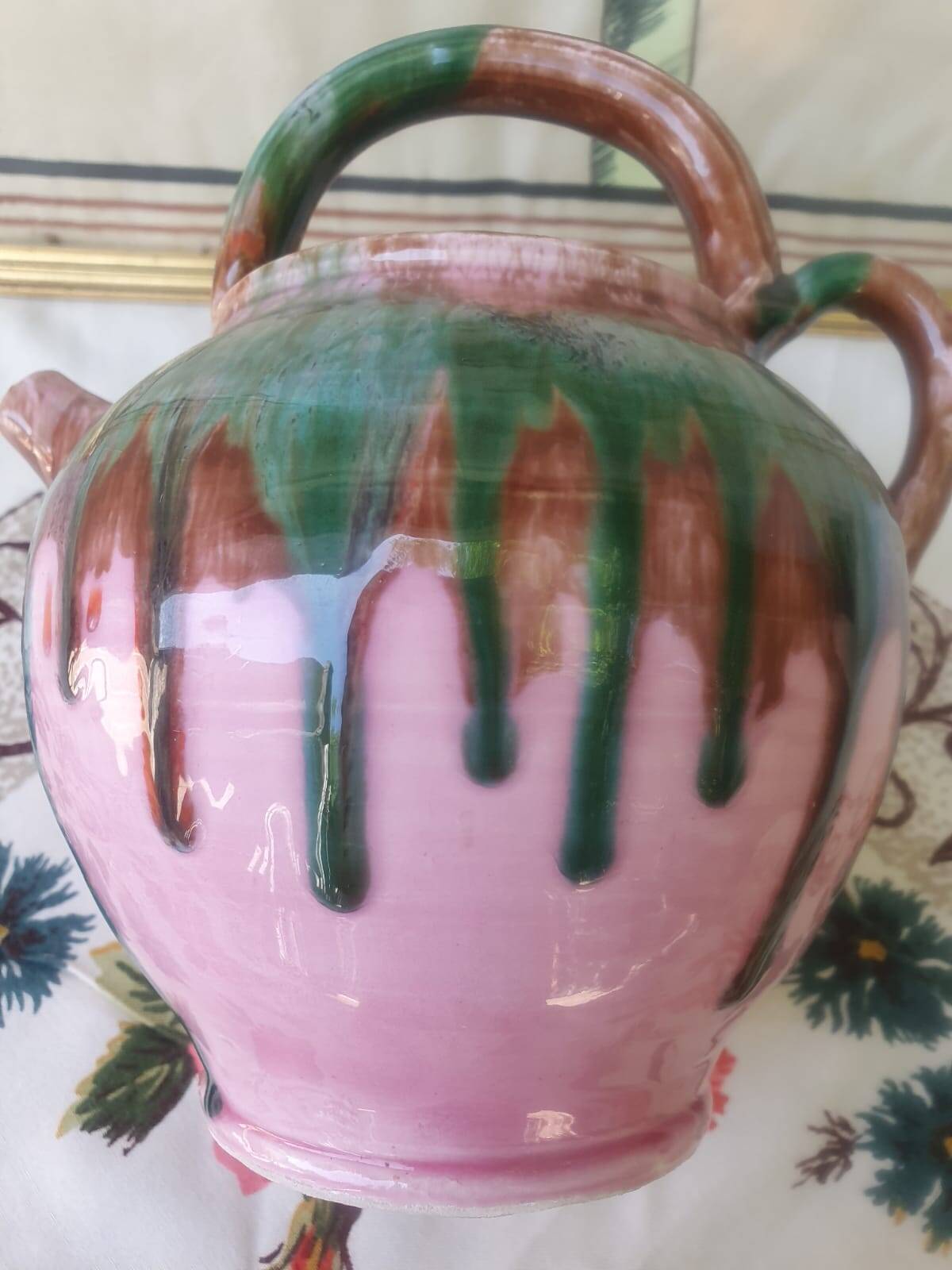 Jug pitcher Provençal earthenware glazed with pink and green glaze.