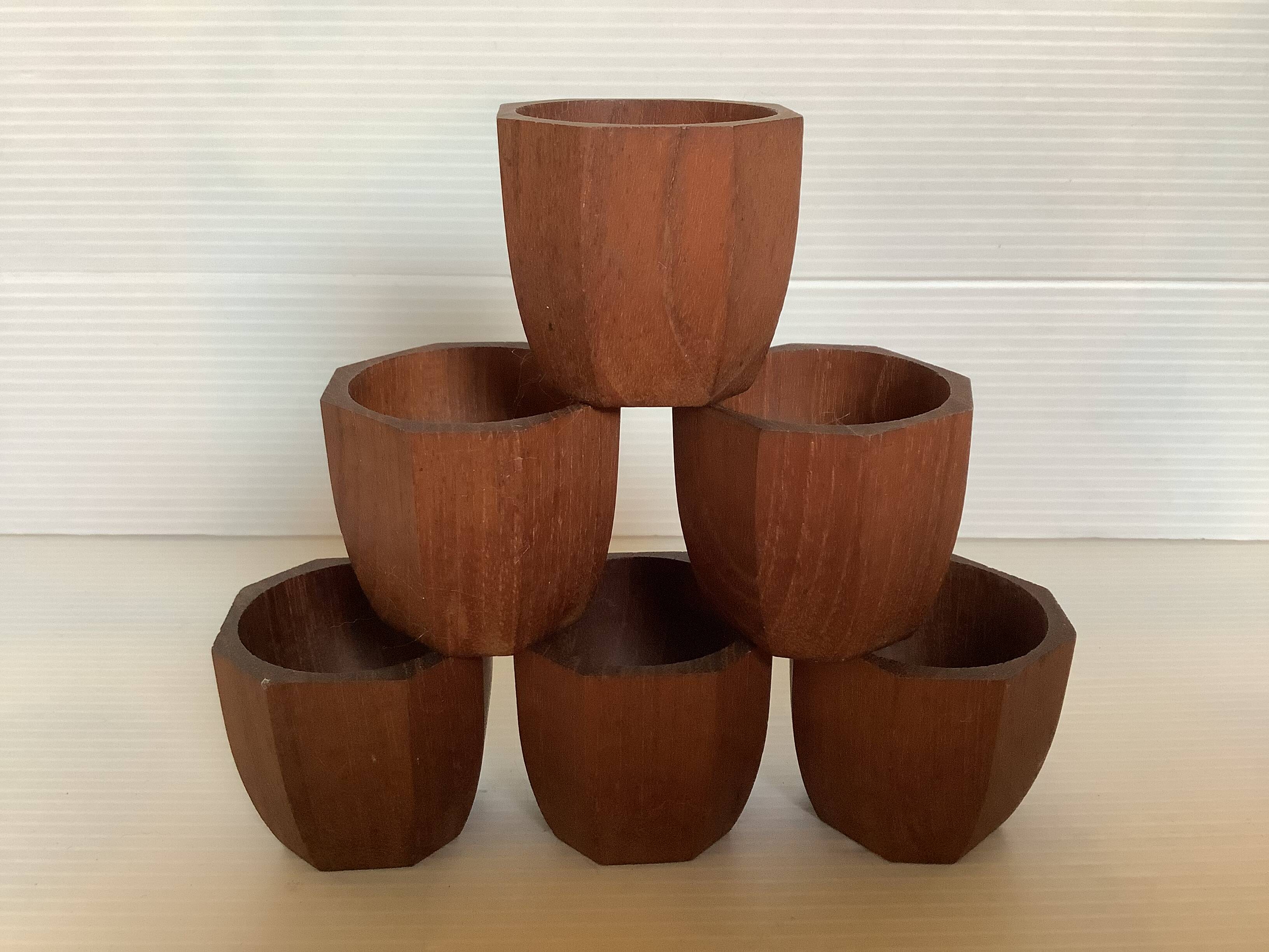 Six Scandinavian teak wood egg cups