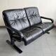 Scandinavian 2-seater sofa 1970s vintage in black leather and curved wood