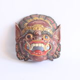 Two polychrome painted and gold leaf gilded Barong dance masks from Bali, Indonesia.