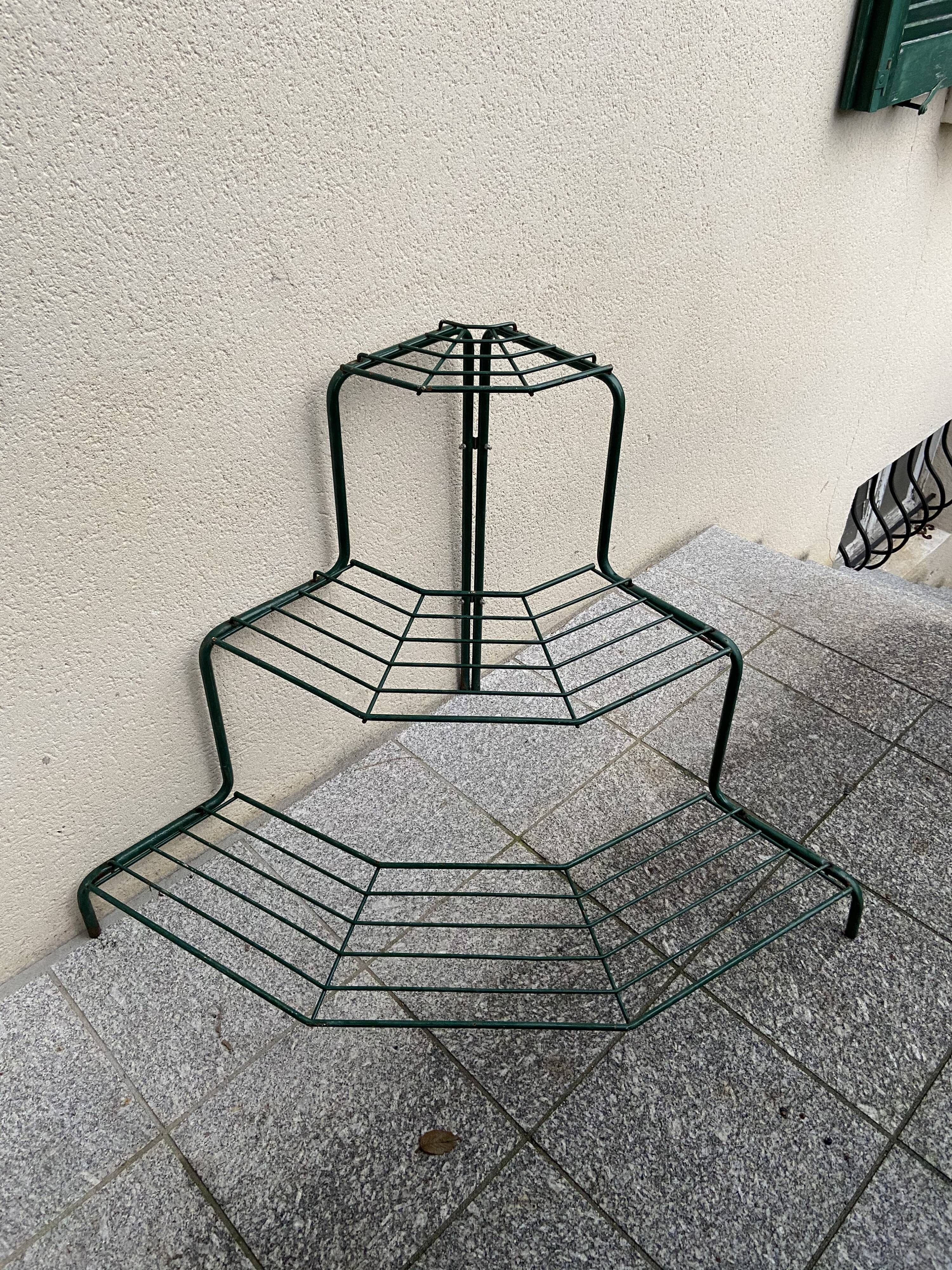 Florist shelf carries metal plants