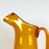 Amber glass carafe from the mid-century German Jagdhaus series and drinking glasses by Wilhelm Braun-Feldweg for Hirschberg, 1960s, set of 7.