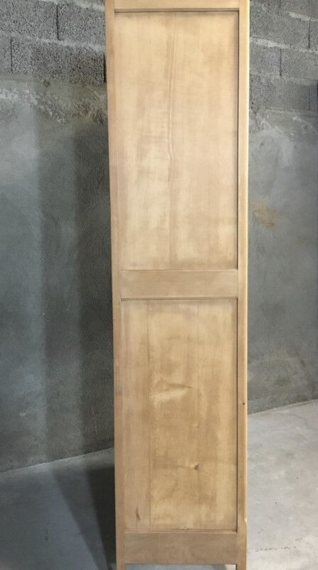 Raw wood hotel cabinet
