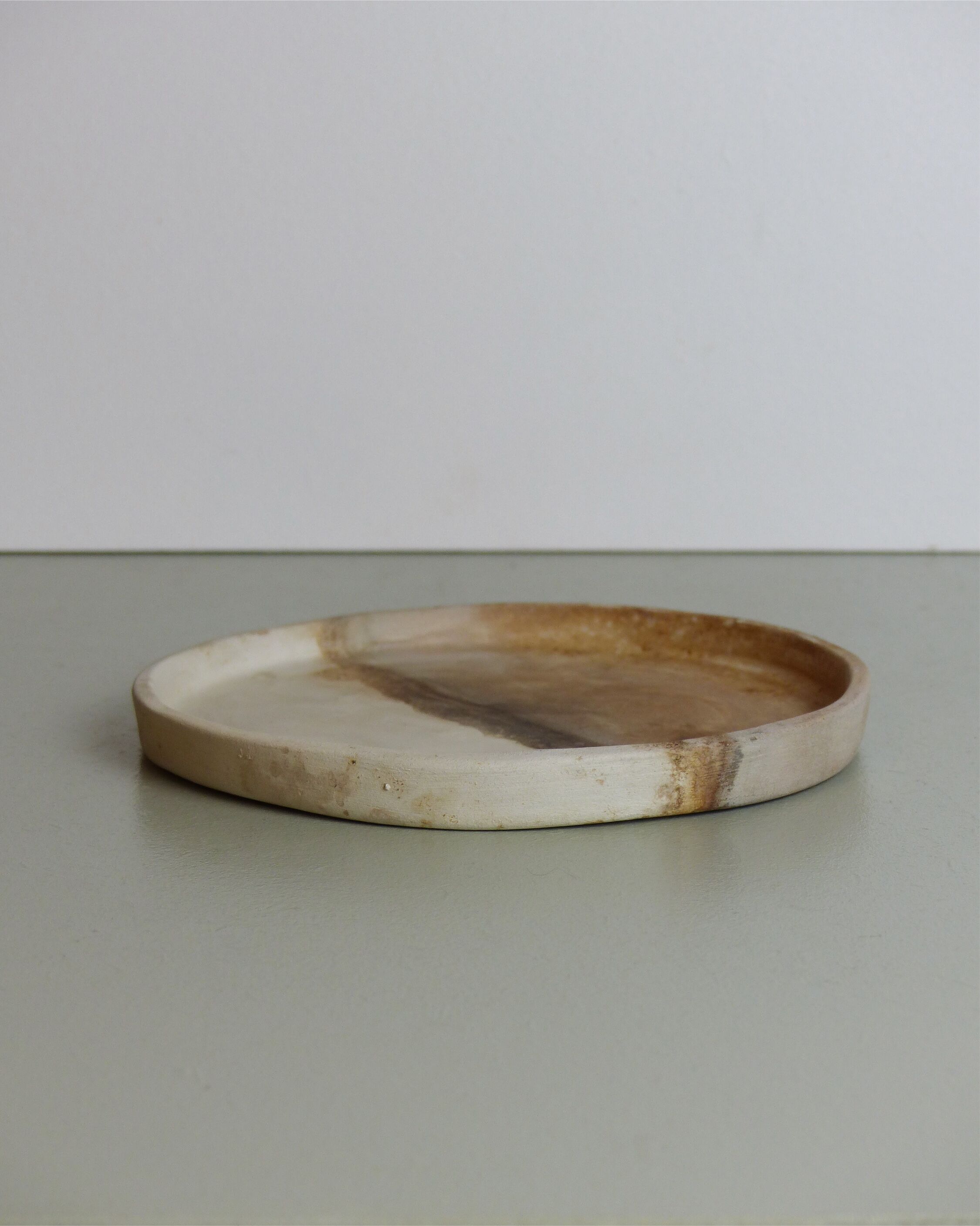 Beige tidy or centerpiece