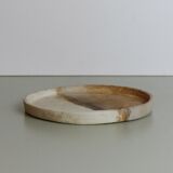 Beige tidy or centerpiece