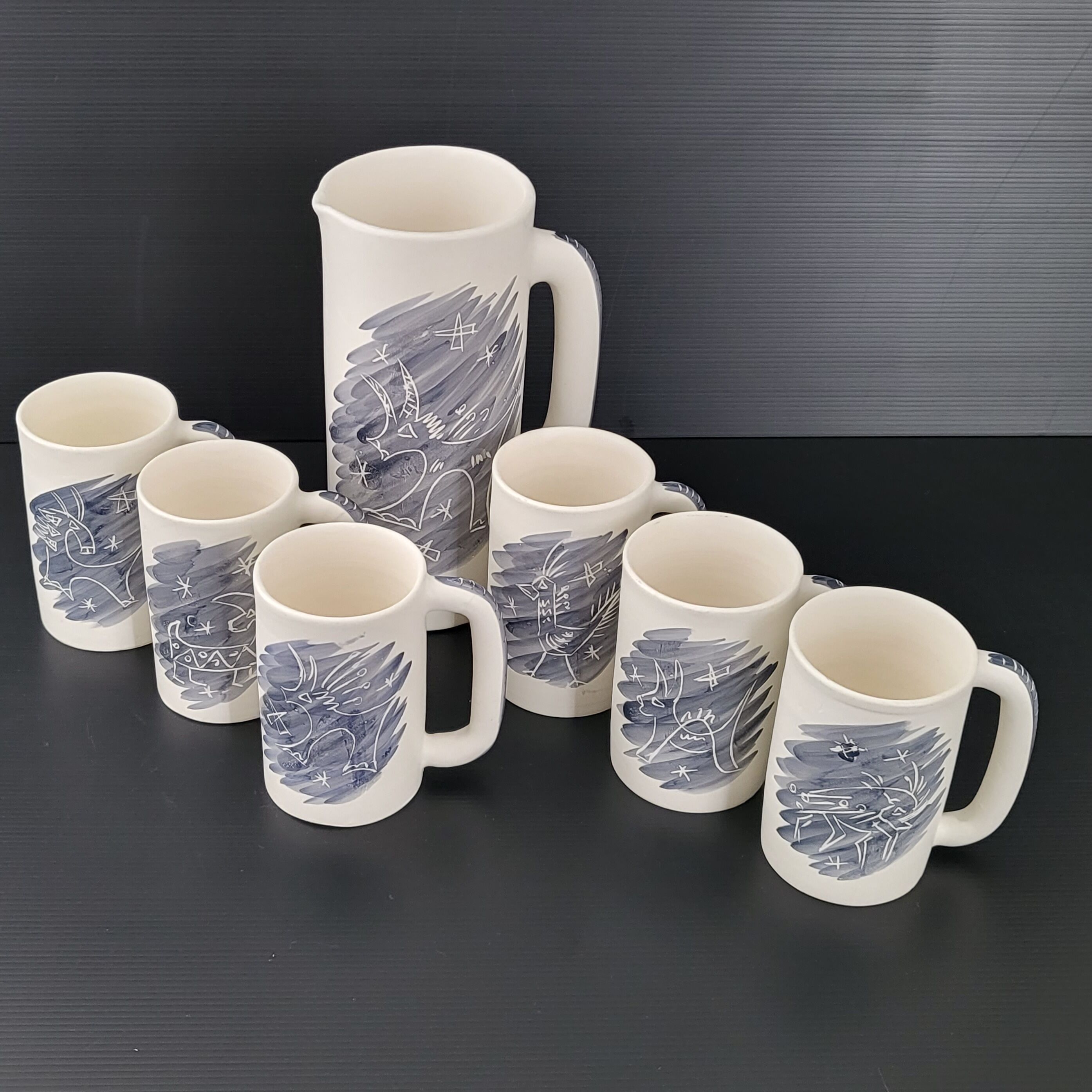 Pitcher and 6 vintage mugs 1950
