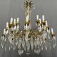 Antique chandelier with 24 light points. Bronze, solid crystal.