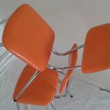 Duo of vintage chairs in orange skai