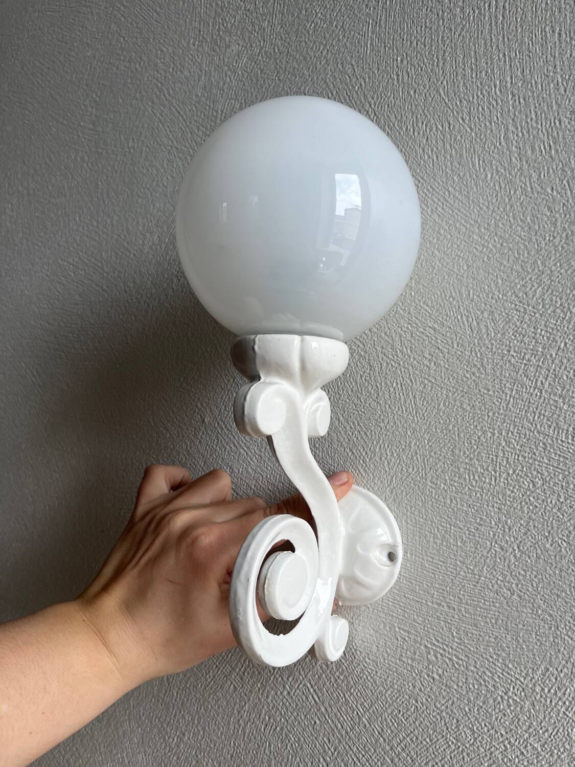 Antique enamelled cast iron wall lights / opaline globe