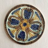 Art Nouveau earthenware bottle coaster/trivet, late 19th/early 20th century
